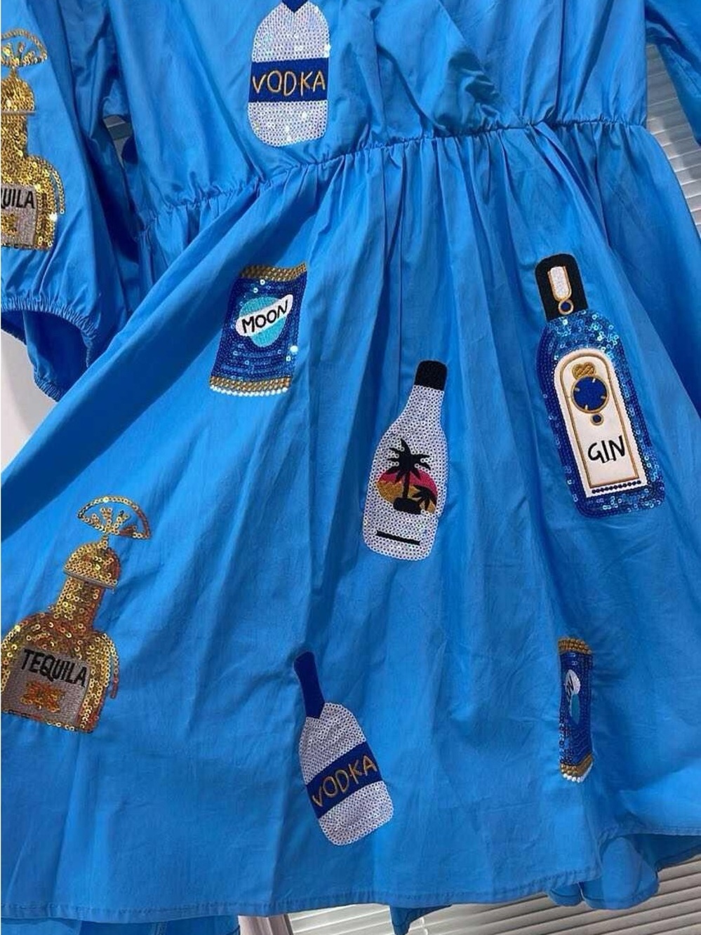 Blue Embellished Midi Dress with Bottle Appliqués - Picture 2 of 3